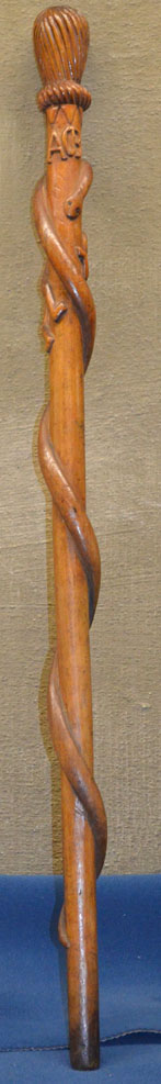 a%20wooden%20cane%20with%20serpent%20design
